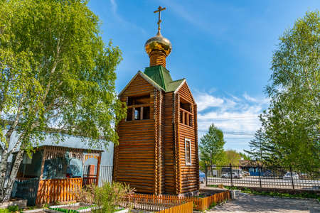 Burabay Borovoe City Russian Orthodox Christian Church Wooden Bell Tower View on a Sunny Blue Sky Dayの写真素材