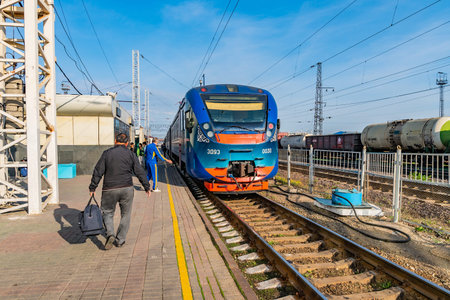 Nur-Sultan Astana City Main Railway Station View of Kazakhstan Temir Zholy Train on a Sunny Blue Sky...