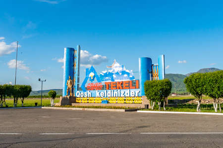 Tekeli City Picturesque View of Welcome Billboard in Kazakh Language on a Sunny Blue Sky Dayのeditorial素材