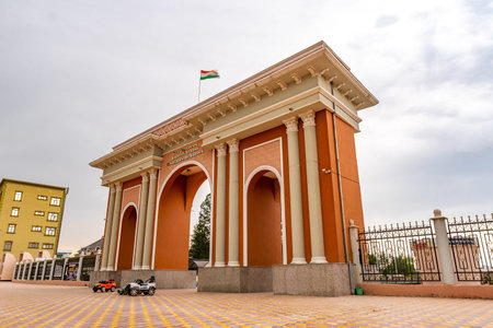 Isfara Sayfuddin Isfarangi Park Triumphal Arc Main Entranc Gate Picturesque View on a Cloudy Rainy Dayの写真素材