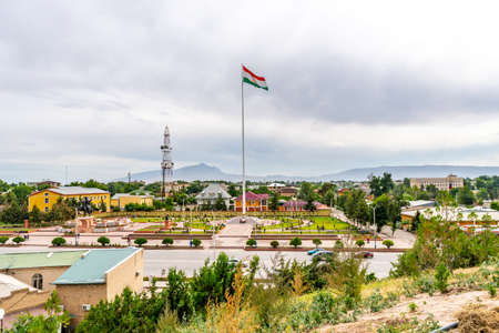 Qurghonteppa Bokhtar High Angle View of Ismoil Somoni Square Waving Tajikistan Flag on a Cloudy Rainy Dayの写真素材