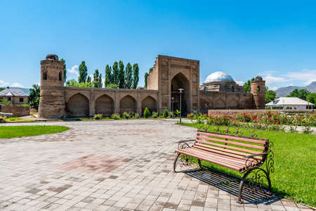 Hisor Fortress Madrasa Kukhna Picturesque Breathtaking View with Sitting Bench on a Sunny Blue Sky Dayの写真素材