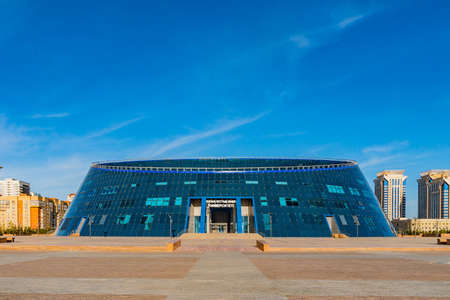 Nur-Sultan Astana Kazakh National University of Arts Frontal View on a Sunny Cloudy Blue Sky Dayのeditorial素材