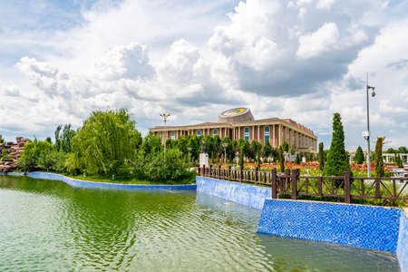 Dushanbe Flag Pole Park Picturesque View of Lake and Tajikistan National Museum on a Cloudy Blue Sky Dayのeditorial素材