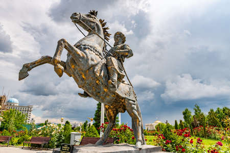 Dushanbe Flag Pole Park Picturesque View of Tajikistan National Museum with Giyosiddin Guri Statue on a Sunny Blue Sky Dayのeditorial素材