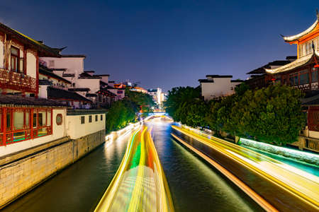 Nanjing Qinhuai River Popular Sightseeing Spot for Visitors Cruising with Ships at Late Nightのeditorial素材