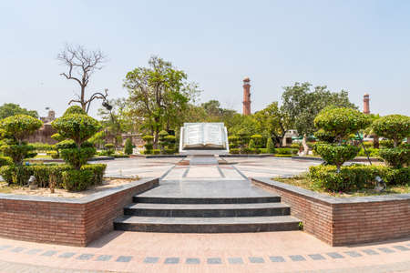 Lahore Iqbal Park Picturesque View of a Book Monument with Urdu Inscription on a Sunny Blue Sky Dayの写真素材
