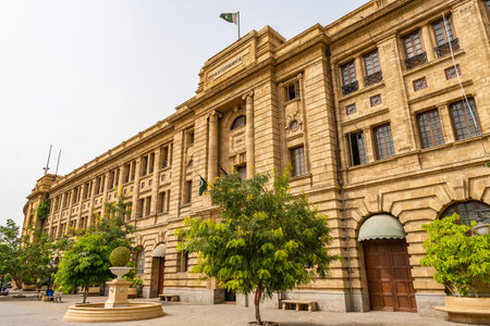 Karachi Imperial Old Custom House Picturesque View with Waving Pakistan Flag on Top of Roof on a...