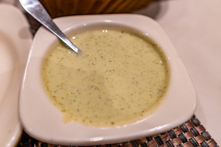 Traditional Mouthwatering Pakistani Fresh Cold Raita Side Dish Served in a White Plateの写真素材
