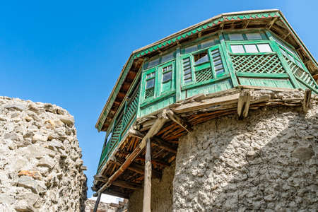 Karimabad Altit Town Breathtaking Picturesque View of the Old City Houses on a Sunny Blue Sky Dayの写真素材