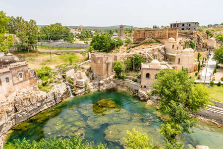 Chakwal Qila Katas Raj Hindu Temples Dedicated to Shiva Picturesque View of the Pond on a Sunny Blue Sky Dayの写真素材