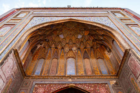 Lahore Wazir Khan Mughal Era Mosque Picturesque View of Muqarna Honeycomb on a Sunny Blue Sky Dayの写真素材