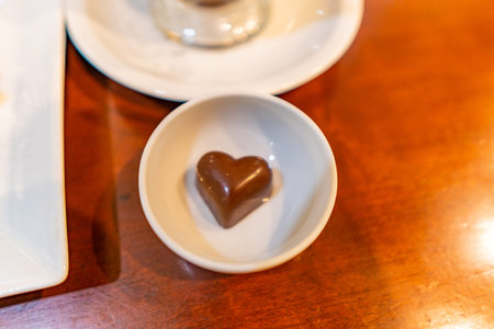 Traditional Mouthwatering Tasty Belgian Heart Shaped Chocolate Served on a White Bowl