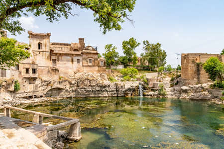 Chakwal Qila Katas Raj Hindu Temples Dedicated to Shiva Picturesque View of the Pond on a Sunny Blue Sky Dayの写真素材