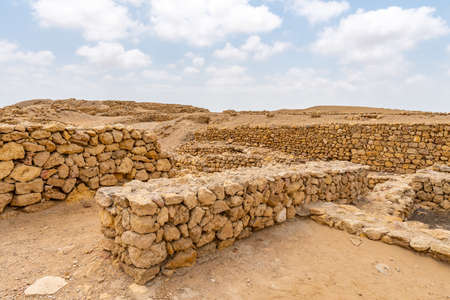 Bhambhore Fort Ruins Picturesque View of the Ruined Foundations on a Sunny Blue Sky Dayの写真素材