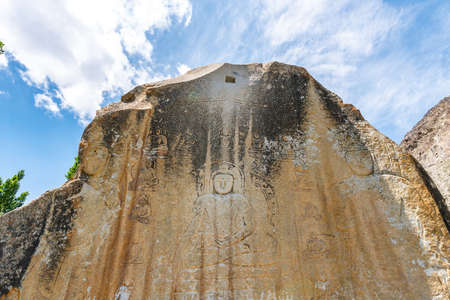 Skardu Manthal Picturesque View of Carved Buddha Large Granite Rock Relic on a Sunny Blue Sky Dayの写真素材