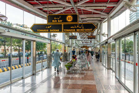 Islamabad Rawalpindi Metro Bus Station Centaurus South at Blue Area View of People who are Sitting and Waiting for the Busのeditorial素材