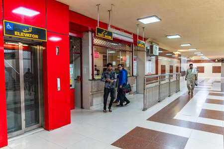 Islamabad Rawalpindi Metro Bus Station Centaurus South at Blue Area View of People Buying Token Ticket at Underway Passageのeditorial素材