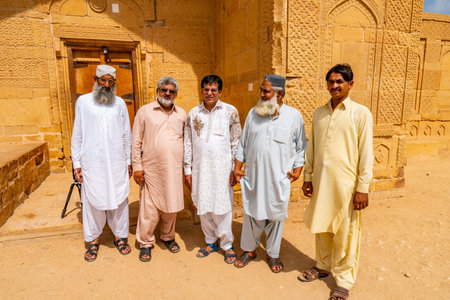 Makli Hill Necropolis UNESCO World Heritage Site Picturesque View of Pakistani Visitors on a Sunny...