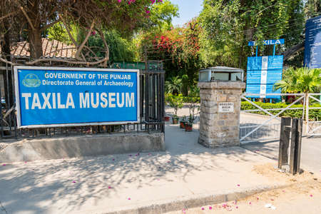 Taxila Archeological Museum Picturesque View of the Welcome Billboard on a Sunny Blue Sky Dayのeditorial素材
