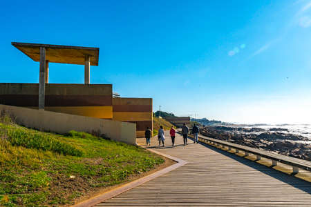Porto Homem do Leme Beach Picturesque View with Walking People on a Sunny Blue Sky Dayのeditorial素材