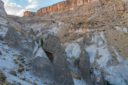Soganli Valley Breathtaking Picturesque View of Rock-Cut Houses and Cloisters on a Blue Sky Day in...