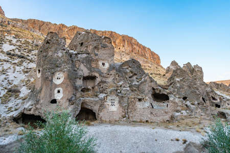 Soganli Valley Breathtaking Picturesque View of Rock-Cut Houses and Cloisters on a Blue Sky Day in Summerの写真素材