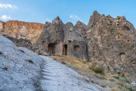 Soganli Valley Breathtaking Picturesque View of Rock-Cut Houses and Cloisters on a Blue Sky Day in Summerの写真素材