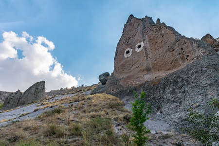 Soganli Valley Breathtaking Picturesque View of Rock-Cut Houses and Cloisters on a Blue Sky Day in Summerの写真素材