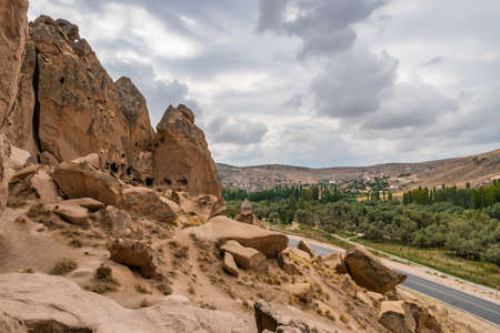 Selime Cathedral Breathtaking Picturesque View of Rock-Cut Houses and Churches on a Blue Sky Day in Summerの写真素材
