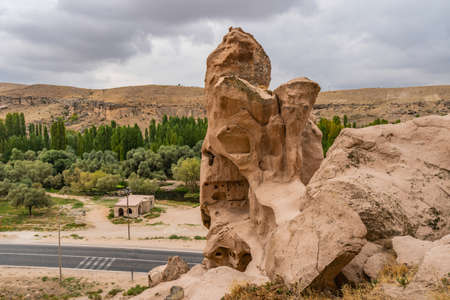 Selime Cathedral Breathtaking Picturesque View of Rock-Cut Houses and Churches on a Blue Sky Day in Summerの写真素材