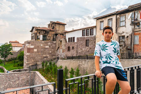 Ankara Castle Kale Breathtaking Picturesque View of a Young Turkish Boy on a Blue Sky Day in Summerのeditorial素材