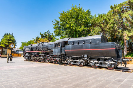 Gaziantep Railway Station Breathtaking Picturesque Frontal View of Old Locomotive on a Blue Sky Day...