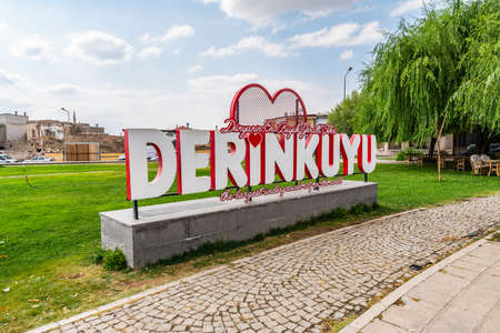 Derinkuyu Underground City Breathtaking Picturesque View of Welcome Billboard on a Blue Sky Day in Summerのeditorial素材