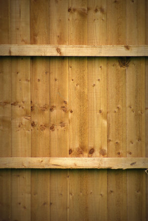 Vignette style textured wooden fence background