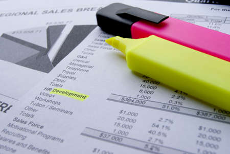 Accounts and charts with business equipmentの写真素材