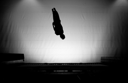silhouette on trampolineの写真素材