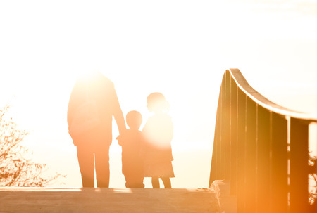 pedestrians on bridge in freiburgの写真素材