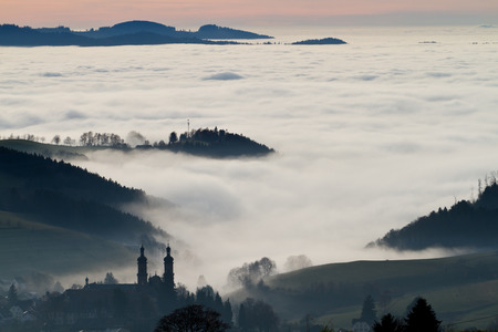St  Peter in black forest, Germany, above cloudsの写真素材