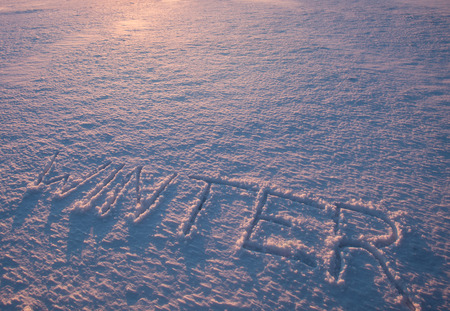 word winter written in snowの写真素材