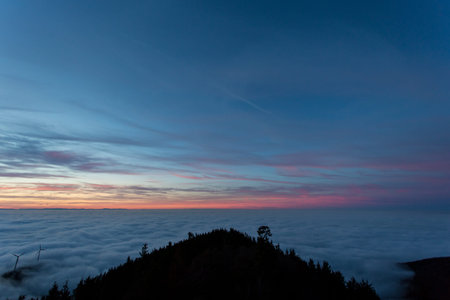sunset over fog in black forest, Germany