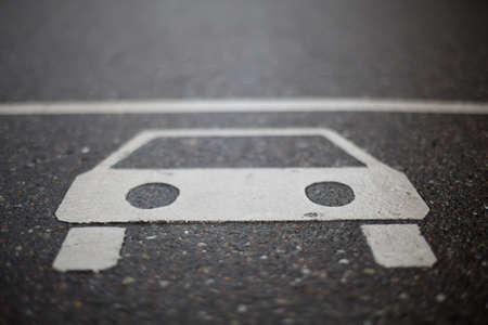 sign of car on roadの写真素材