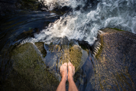 feet in waterfallの写真素材