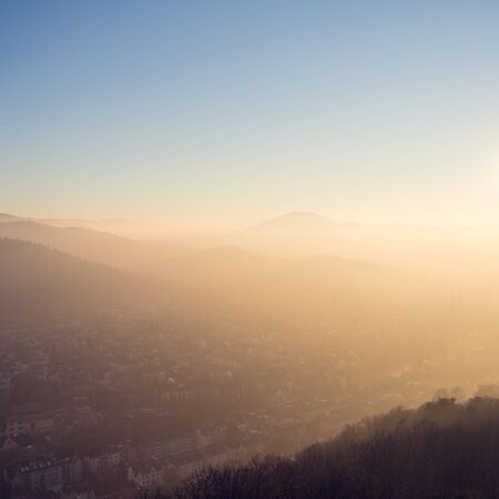 fog over Freiburg, Germany at sunsetの写真素材