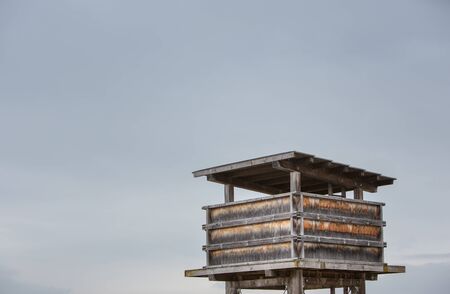 wooden raised blind in skyの写真素材