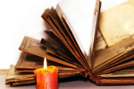 An old book and a candle