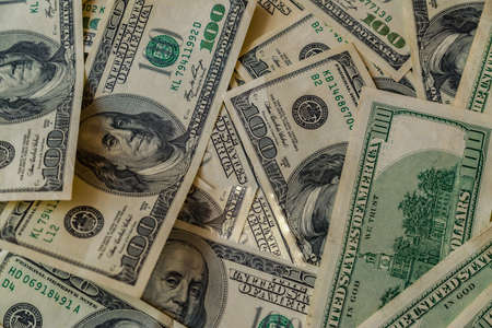 Money on a wooden tableの写真素材