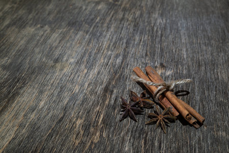 cinnamon stick on old wooden backgroundの写真素材