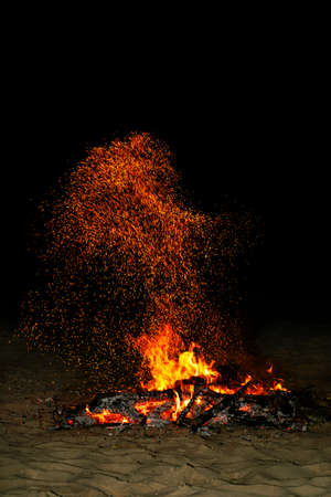 night fire on the shores of the Mediterraneanの写真素材