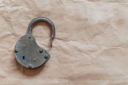 old lock on old paper background